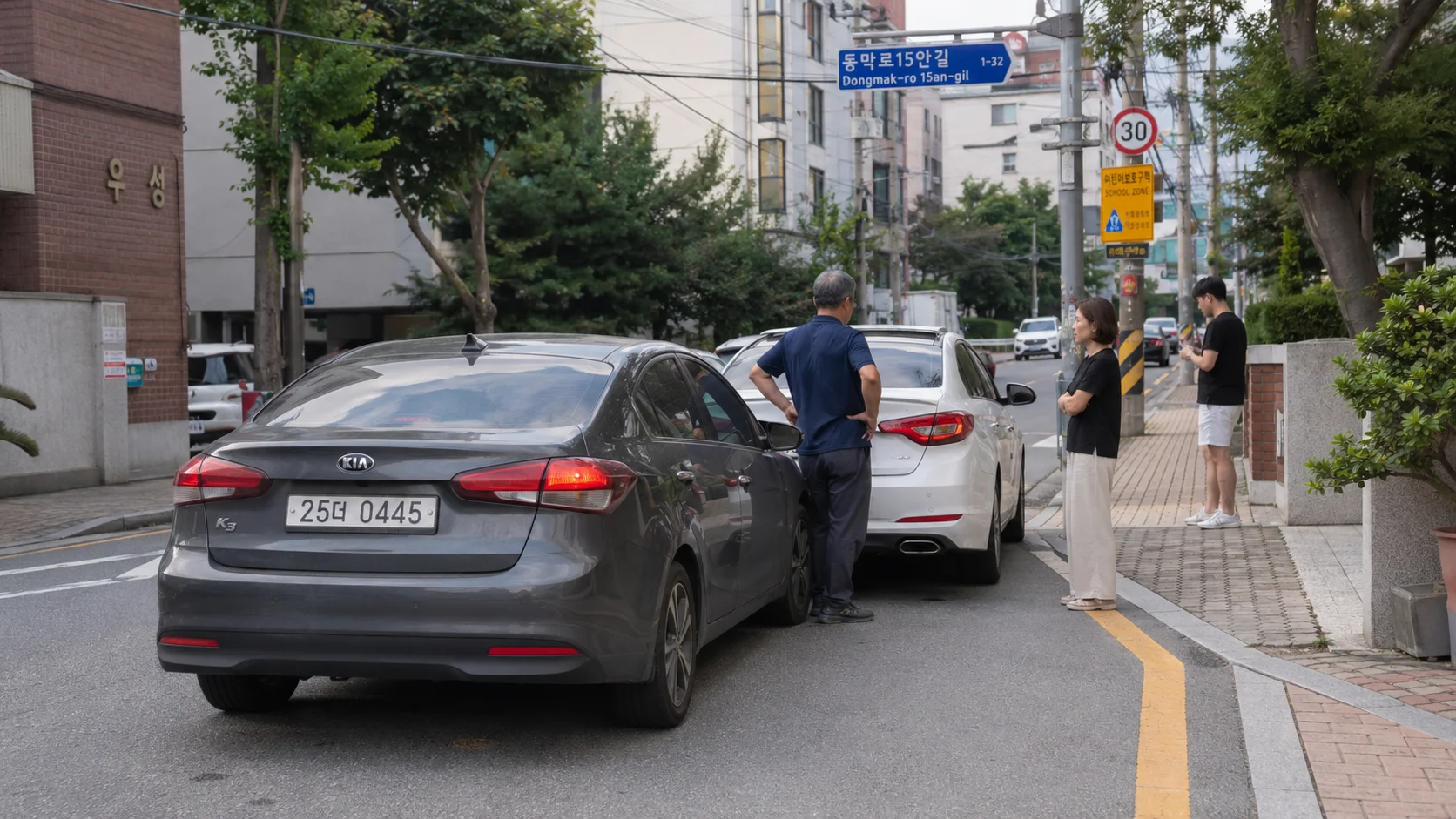 수영역 교통사고 입원실|어린이보호구역 도로 위 자동차 접촉사고 현장